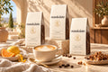 Three Manukalatte bags, Citrus, Lemon and Pralines, with a latte